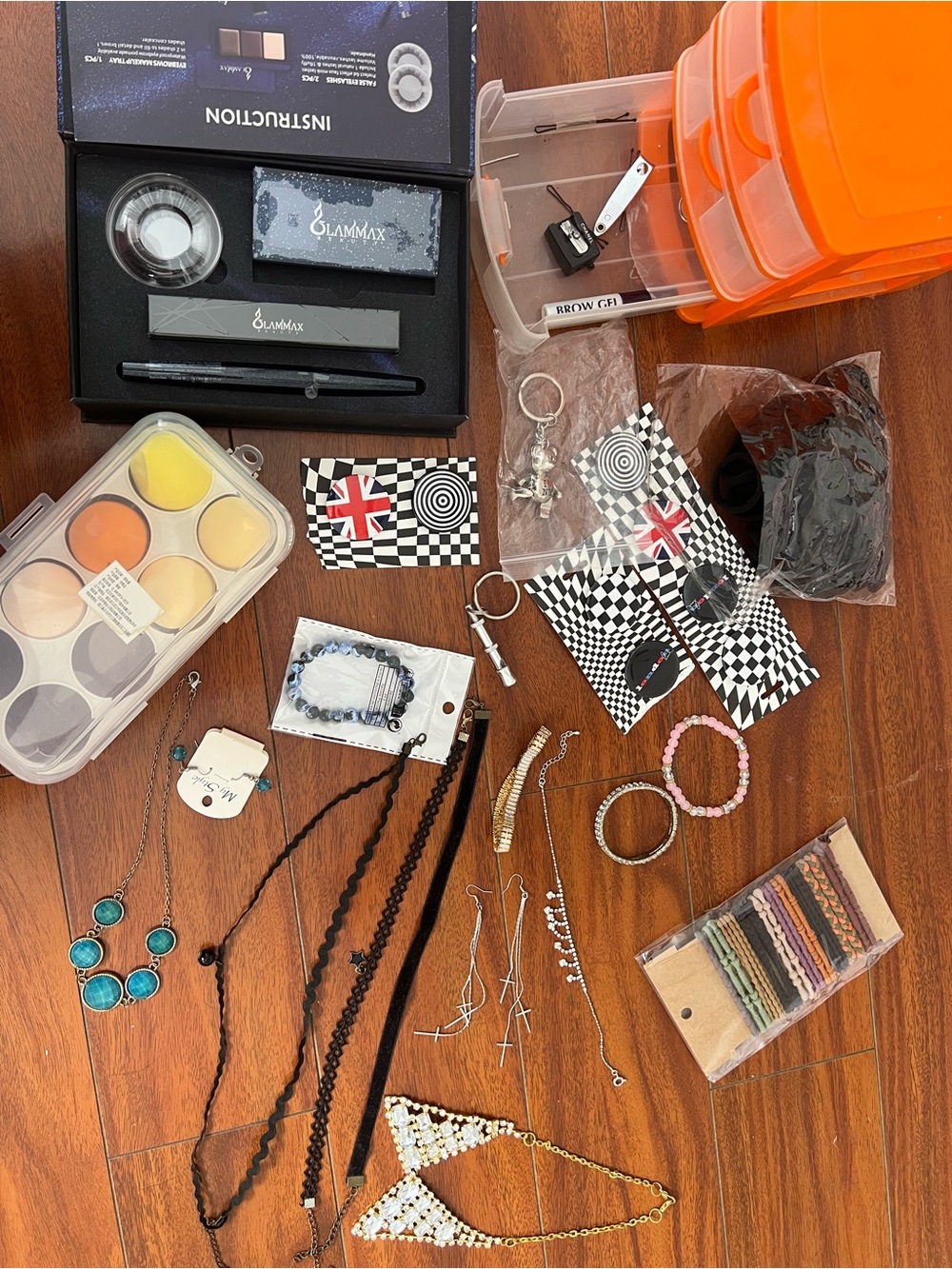 collection of makeup products including eyebrow products and false